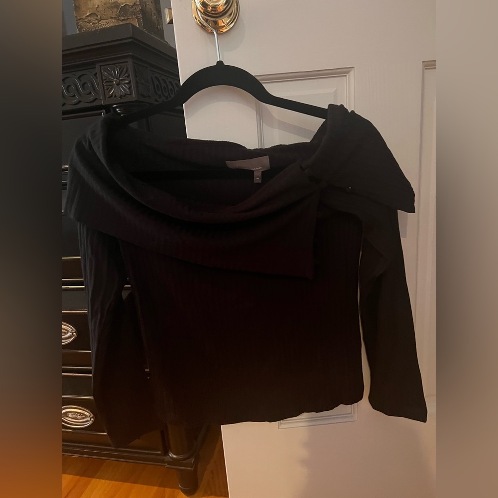 Anthropologie black off-the-shoulder top. Never worn. NWT.